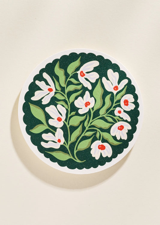 Coaster with floral design on a beige background