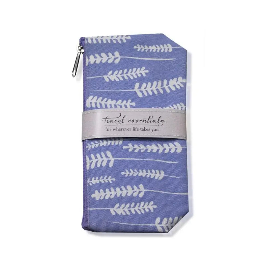 A lavender-patterned canvas bag sits on a white background. 