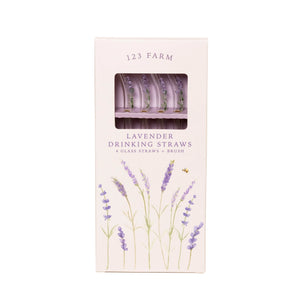 A set of 4 lavender drinking straws in their paper packaging. 